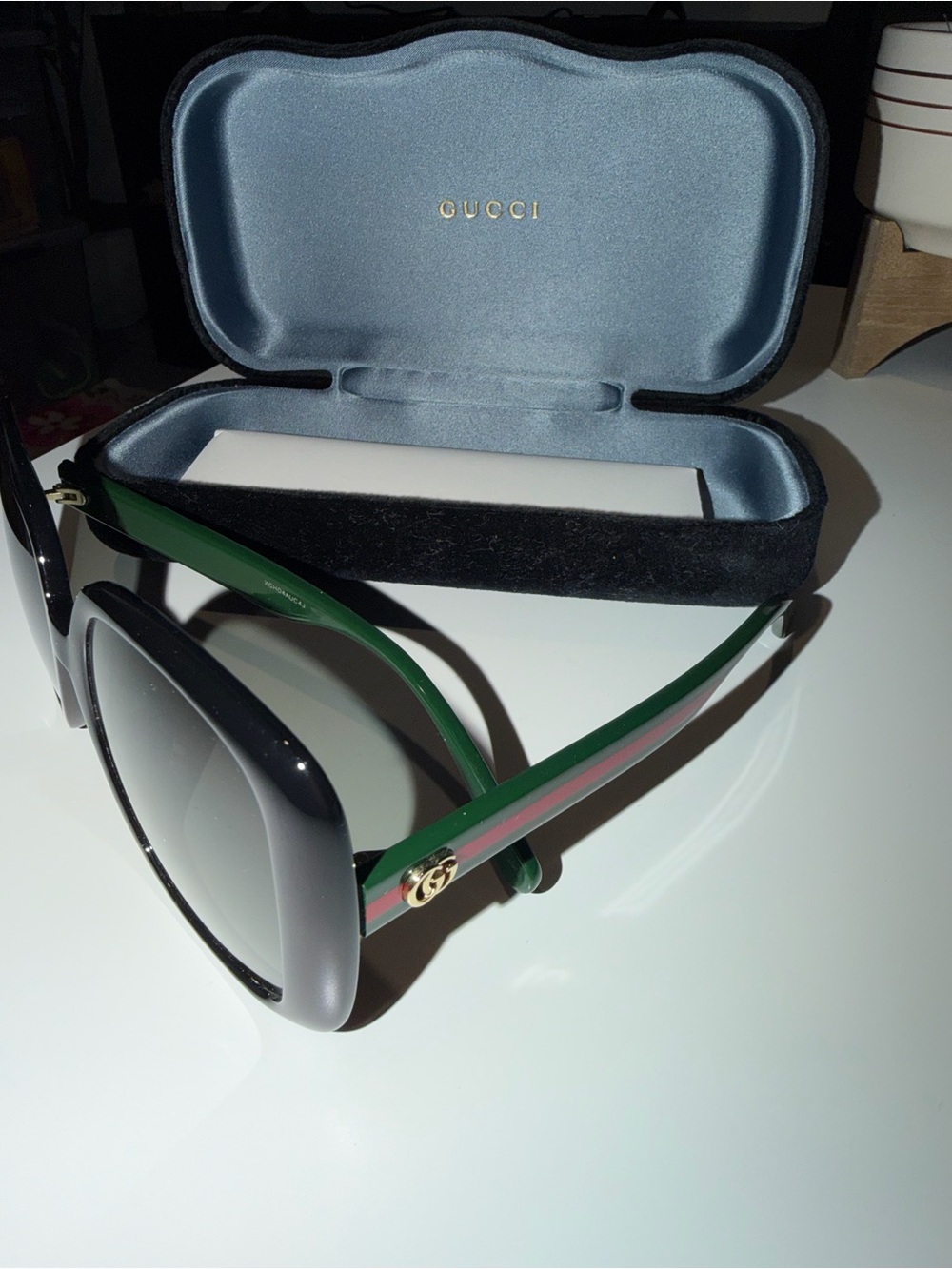 Gucci Women’s Black Frames with Green and Red Stripe Temples Sunglasses